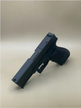 Side profile view of the Kineti-Tech Serrated Beveled Complete Slide mounted on a Glock® 17 Gen 3 frame in Armor Black CERAKOTE® finish. The image highlights the beveled edges, deep serrations, and durable finish designed for duty and defense applications.

Side view of Kineti-Tech Serrated Beveled Slide for Glock 17 Gen 3 in Armor Black CERAKOTE® finish.