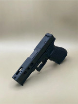 Kineti-Tech LWP Complete Slide for Glock® 17 Gen 3 in Armor Black CERAKOTE® finish. Showcases deep rear serrations, integrated lightening cuts for faster cycle rate, and optic-ready design for Shield® RMSc footprint optics.

Armor Black Kineti-Tech LWP Slide for Glock 17 Gen 3 with ported barrel and optic-ready design.