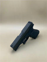 Side profile of the Kineti-Tech OEM Style Beveled Slide for Glock® 19 Gen 3 in Armor Black CERAKOTE® finish. Highlights include OEM-style simplicity, beveled edges, and corrosion-resistant finish for durability.

Side view Armor Black Kineti-Tech OEM Style Beveled Slide for Glock 19 Gen 3.