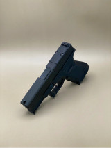 An angled front view of the Serrated Bullnose Slide showcasing the aggressive bullnose contour and deep-cut front serrations. The stainless steel barrel is partially visible, and the optic cut at the rear is highlighted. The image captures the slide’s tactical styling and robust build.

Angled front view of Glock 19 Gen 5/19X Serrated Bullnose Slide showing bullnose contour and optic cut.