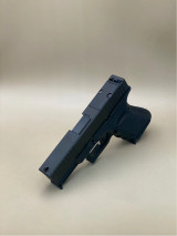 An angled front view of the Serrated Bullnose Slide showcasing the aggressive bullnose contour and deep-cut front serrations. The stainless steel barrel is partially visible, and the optic cut at the rear is highlighted. The image captures the slide’s tactical styling and robust build.

Angled front view of Glock 45 Gen 5 Serrated Bullnose Slide showing bullnose contour and optic cut.