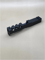 Side view of Kineti-Tech Predator Glock 19 Gen 5/19X Stripped slide with deep-cut serrations for maximum grip and stainless steel barrel visible through forward lightening cuts.

Side view of Kineti‑Tech Predator Glock 19 Gen 5/19X slide with deep‑cut serrations and stainless steel barrel visible through forward lightening cuts.