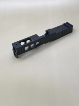Kineti-Tech LWP Stripped Slide for Glock® 45 Gen 5 in Armor Black CERAKOTE® finish. Features lightening window cuts for weight reduction, large port for gas venting, and RMR optic cut for micro red dot compatibility.

Armor Black Kineti-Tech LWP Stripped Slide for Glock 45 Gen 5 with lightening cuts, ported design, and RMR optic cut.