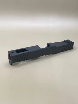 Side‑angled product image showing the Kineti‑Tech Black Ported Stripped slide highlighting its lightweight and performance‑driven design.

Side angled view of Kineti‑Tech Black Ported slide for Glock 17 Gen 3 with lightning cuts and RMR optic cut.