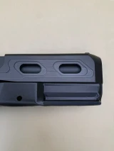 Kineti‑Tech Aero Complete Slide for Glock 45 Gen 5. Features dual 12 o’clock high‑speed lightening window ports, 3 and 6 o’clock barrel‑exposing cuts, deep‑cut rear serrations, and an RMR‑compatible optic footprint. Fully assembled and Made in the USA.

Close up of Kineti‑Tech Aero Slide showing dual 12 o’clock high‑speed lightening window ports and RMR optic cut.