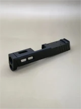 The LWP slide combines weight reduction, improved cycling, and ported barrel compatibility to help reduce recoil and increase shooting performance.

Side view of Kineti-Tech LWP Sig P365 slide with weight-reducing cuts.