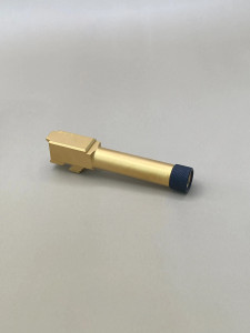 Angled side view of a Glock 26–compatible 9mm threaded barrel featuring a gold Titanium Nitride (TiN) finish, precision‑machined from 416R stainless steel and designed for drop‑in installation with 1/2x28 threads.

Glock 26 threaded 9mm barrel with gold TiN finish – 1/2x28 drop‑in