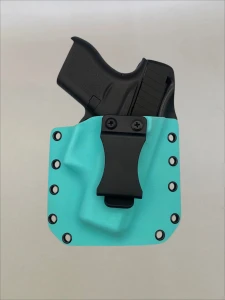 Black Glock 43/43X pistol inserted into a Tiffany Blue Kydex holster with belt clip, demonstrating fit and retention.

Glock 43/43X in Tiffany Blue Kydex holster with forward cant, fits most Glock slides for IWB or OWB carry.