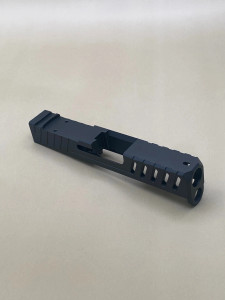 Armor Black CERAKOTE® Kineti-Tech Velocity Slide for Glock® 43/43X with geometric bullnose for smooth draw and reholstering. Includes lightening ports, front serrations, and optic-ready design for RMSc footprint optics.

Armor Black Kineti-Tech Velocity Slide for Glock 43/43X with geometric bullnose and optic cut for RMSc optics.