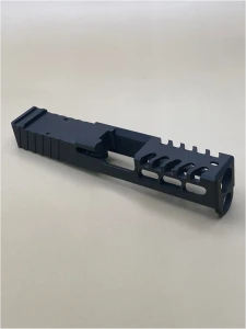 Kineti‑Tech Raptor Cut Stripped Slide for Glock 26 Gen 3 featuring aggressive lightening cuts, micro‑raptor serrations, RMR optic cut, and Armor Black Cerakote. USA‑made and ready for your custom build.

Kineti‑Tech Glock 26 Gen 3 Raptor Cut stripped slide with lightening windows and micro‑raptor serrations, angled front‑side view.