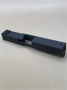 Image of the Kineti‑Tech Glock 17 Gen 3 Serrated Beveled Stripped Slide in Armor Black Cerakote, featuring deep‑cut front and rear serrations, beveled edges, and an RMR optic cut for custom pistol builds.

Kineti‑Tech Glock 17 Gen 3 Serrated Beveled Stripped Slide with Armor Black Cerakote, showing front serrations and beveled cuts.