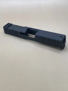 Image of the Kineti‑Tech Glock 19 Gen 3 Serrated Beveled Stripped Slide in Armor Black Cerakote, featuring deep‑cut front and rear serrations, beveled edges, and an RMR optic cut for custom pistol builds.

Kineti‑Tech Glock 19 Gen 3 Serrated Beveled Stripped Slide with Armor Black Cerakote, showing front serrations and beveled cuts.