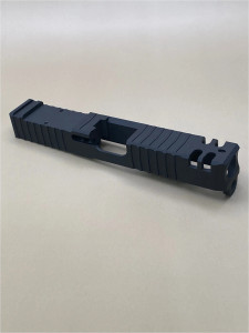 Angled left‑side view of the Kineti‑Tech Phantom Stripped Slide for Glock® 19 Gen 3 featuring a bull nose profile, aggressive front and rear serrations, and Armor Black Cerakote finish.

Kineti‑Tech Phantom stripped slide for Glock 19 Gen 3 with bull nose and deep serrations