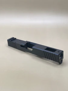 Angled view of the Kineti‑Tech Black Ported Stripped slide showing the aggressive front and rear serrations, top porting, and the Cerakote® finish designed for improved slide manipulation and rapid shot recovery.

Kineti‑Tech Black Ported Stripped Slide for Glock 17 Gen 3 shown at an angle with top porting and serrated slide cuts.