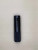 A black cylindrical barrel shroud tube shown upright against a light background. The body features elongated vertical slots and circular vent holes measuring 6 1/2 inches length arranged symmetrically around the tube. The lower portion has a textured knurled base, and the part is evenly lit to show surface finish and machining details.

Black cylindrical barrel shroud with vertical slots, circular vent holes, and a knurled base, shown upright on a light background.