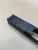 Kineti-Tech RMR to RMSc Black adapter plate installed on a Glock slide, shown in an angled view highlighting the low-profile fit and seamless integration. Designed to convert RMR cut slides to accept RMSc footprint optics while maintaining a clean sight picture.

RMR to RMSc Black adapter plate installed on Glock slide low profile optic mount.