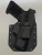 Black Glock pistol inserted into a Black Kydex holster with belt clip, demonstrating fit and retention.

Black Kydex holster for Glock 19 Gen 1-5 with forward cant, fits most Glock slides for IWB or OWB carry.