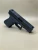 A left-side profile of the Kineti-Tech Serrated Bullnose Complete Slide mounted on a Glock® 45 Gen 5 frame. The Armor Black CERAKOTE® finish is clearly visible, along with deep-cut front and rear serrations. The slide is shown against a neutral background, emphasizing its rugged design and optic-ready rear cut.

Left-side view of Kineti-Tech Serrated Bullnose Slide for Glock 45 Gen 5 with deep serrations and black CERAKOTE® finish.