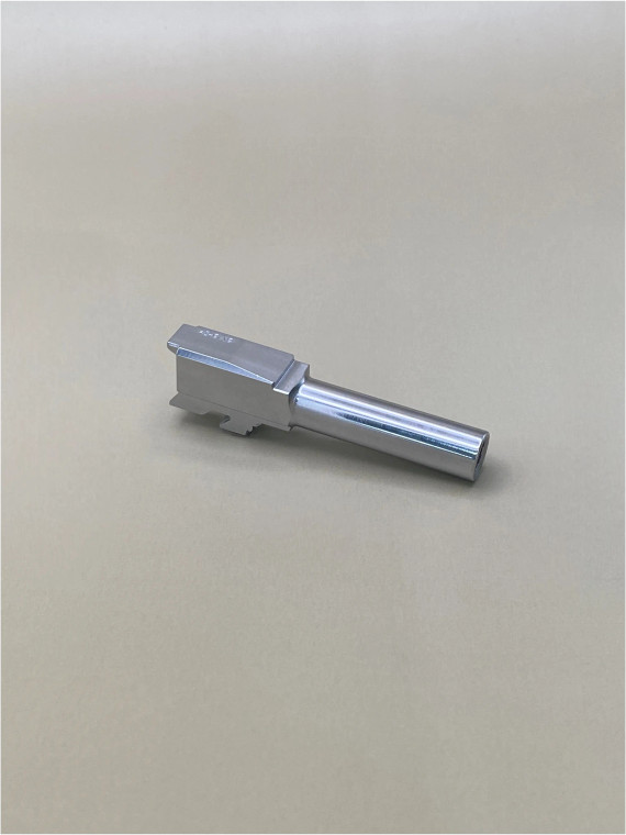 Angled side view of a Glock® 43/43X compatible 9mm barrel manufactured from 416R stainless steel. This drop-in replacement barrel features a precision-machined profile with a target crown and a durable stainless steel finish, designed for reliable performance and easy installation.

Glock 43/43X compatible 9mm stainless steel barrel side view drop-in replacement.