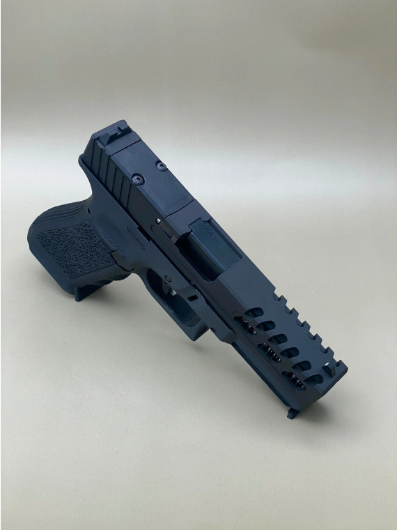 Kineti-Tech Raptor Cut Complete Slide for Glock 17 Gen 5 in Armor Black Cerakote finish, featuring lightening window cuts and rear optic cut for RMR footprint.

Armor Black Kineti-Tech Raptor Cut Slide for Glock 17 Gen 5 with lightening cuts and RMR optic cut.