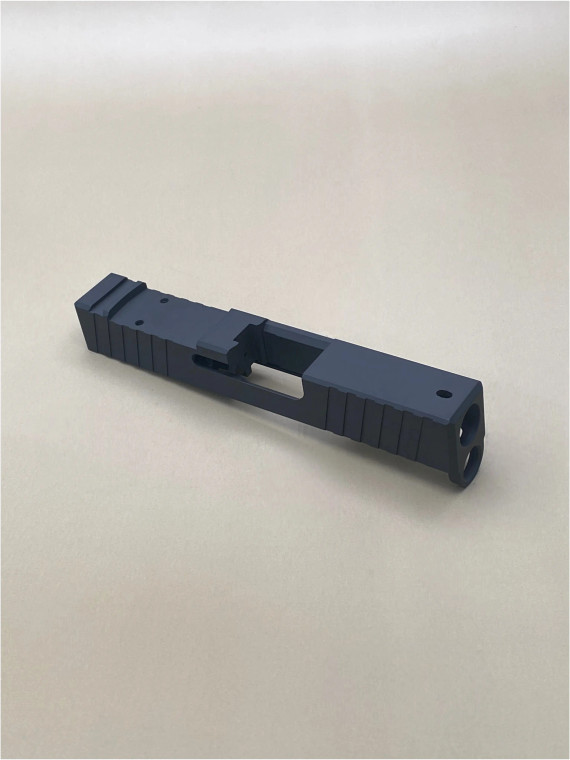 Image of the Kineti‑Tech Glock 43/43x Serrated Beveled Stripped Slide in Armor Black Cerakote, featuring deep‑cut front and rear serrations, beveled edges, and an RMSc optic cut for custom pistol builds.

Kineti‑Tech Glock 43/43x Serrated Beveled Stripped Slide with Armor Black Cerakote, showing front serrations and beveled cuts.