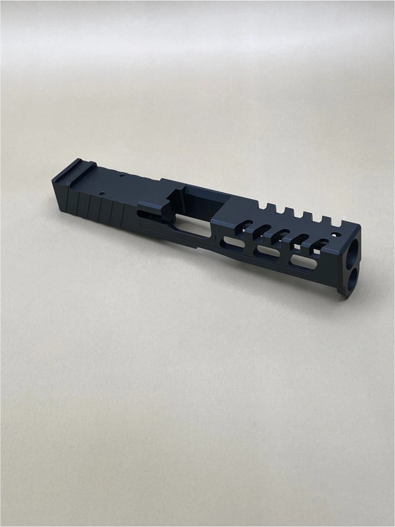 Kineti-Tech Raptor Cut Stripped Slide for Glock 45 Gen 5 in Armor Black Cerakote finish, featuring lightening window cuts and rear optic cut for RMR footprint.

Armor Black Kineti-Tech Raptor Cut Stripped Slide for Glock 45 Gen 5 with lightening cuts and RMR optic cut.