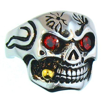 Stainless steel skull ring with red CZ eyes! 
 Skull has a gold plated bullet tip! 


