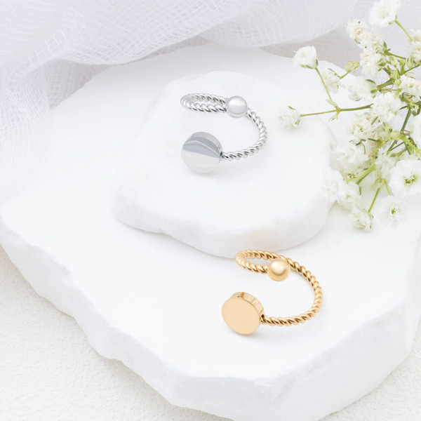 Adjustable rings that are engravable email initial you would like engraved