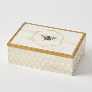 Ever since Napoleon, we French have been obsessed with Bees. A symbol of unity, hard work and loyalty, it takes a big place in our home style. 
Stylish and versatile, the Bee Deco Box is sure to bring interest to any space. Crafted with white bone and featuring a golden bee pattern it’s as stunning as it is practical. Use it as a decorative piece, a jewellery box or to keep your trinkets and treasures safe. Ever since Napoleon, we French have been obsessed with Bees. A symbol of unity, hard work and loyalty, it takes a big place in our home style. 
Stylish and versatile, the Bee Deco Box is sure to bring interest to any space. Crafted with white bone and featuring a golden bee pattern it’s as stunning as it is practical. Use it as a decorative piece, a jewellery box or to keep your trinkets and treasures safe.