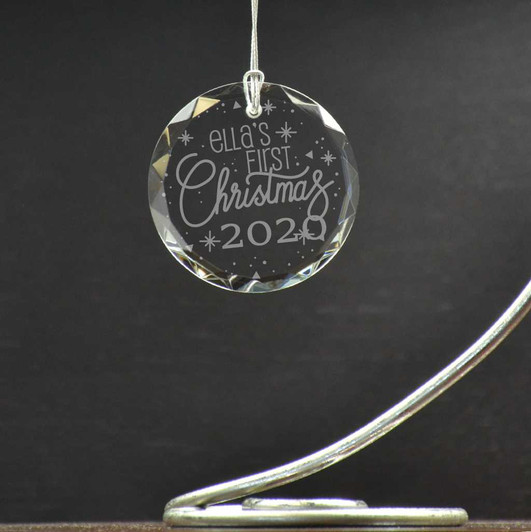 Personalized round glass ornament is a great addition to the Christmas tree for baby's first Christmas