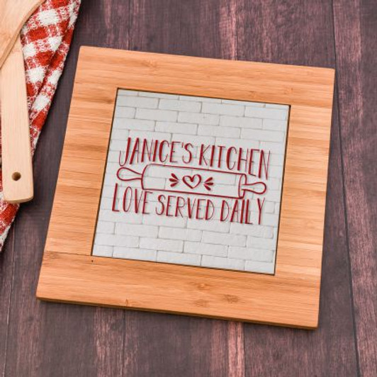 Give her a unique gift with this personalized trivet that features her name