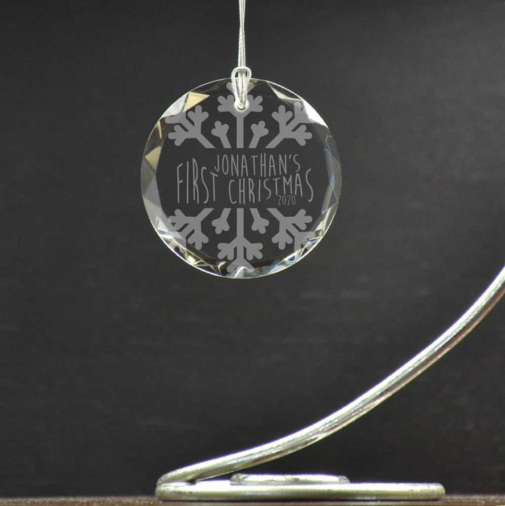 Personalized this snowflake theme glass ornament to celebrate baby's first Christmas.