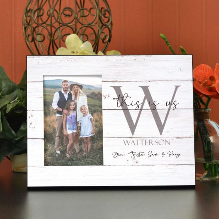 Personalized Family Frame holds a 4"x6" picture and is personalized with family last name and member first names.