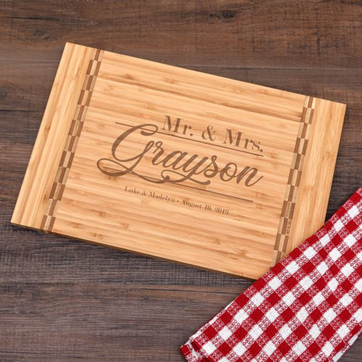 Mr & Mrs Personalized cutting board is a practical wedding gift