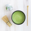 Ceremonial Matcha tin 30g with whisk and scoop and bowl of matcha