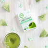 Matcha Infused Sencha product with tea bags with drink