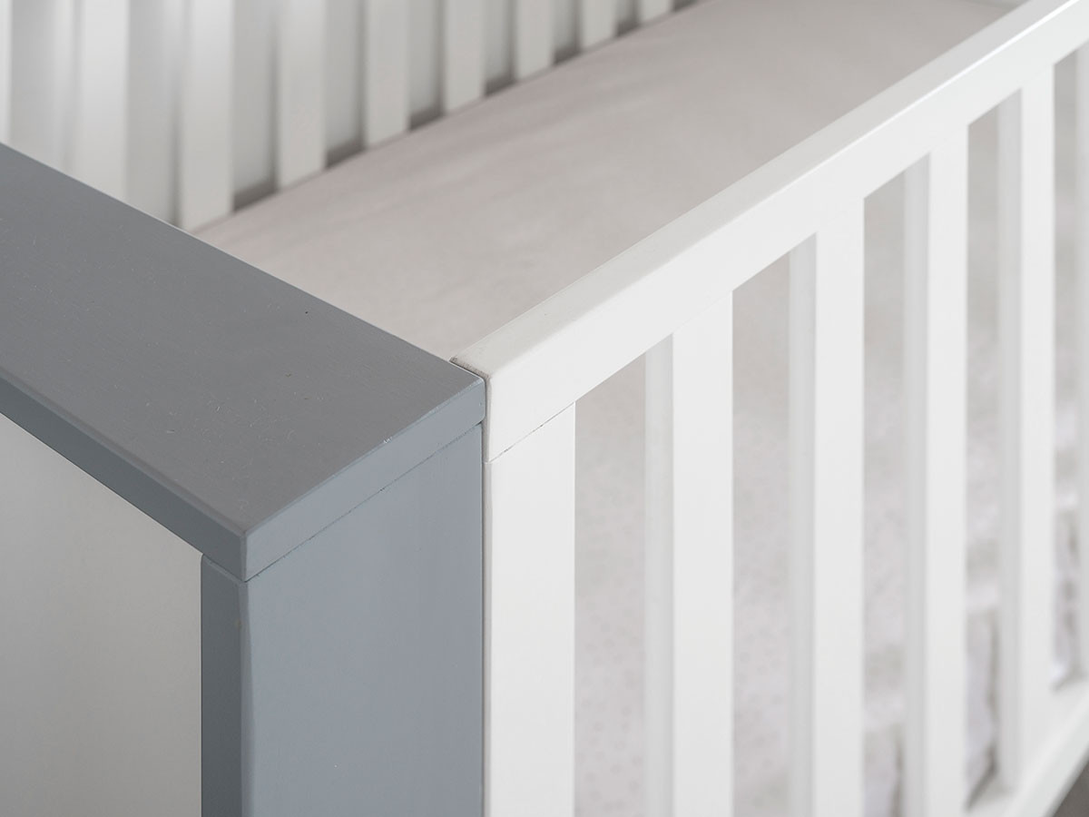 grey and white cot