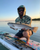 Fisherman wearing Smith Optics Lowdown 2 model while showing off a sea trout he just caught.