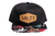 Salty Snapback. Florida born hat with tropical flowers on the bill. Leather patch on snapback.  Love Florida and the Beach life? This hat is for you. Salty Snapback. Florida born hat with tropical flowers on the bill. Leather patch on snapback.  Love Florida and the Beach life? This hat is for you.