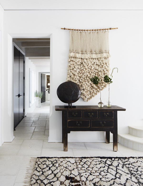 Harrison Residence entry hallway interior featuring organic textures, natural tones and layered materials reflecting Hamptons style architecture Australia by Betsy Brown