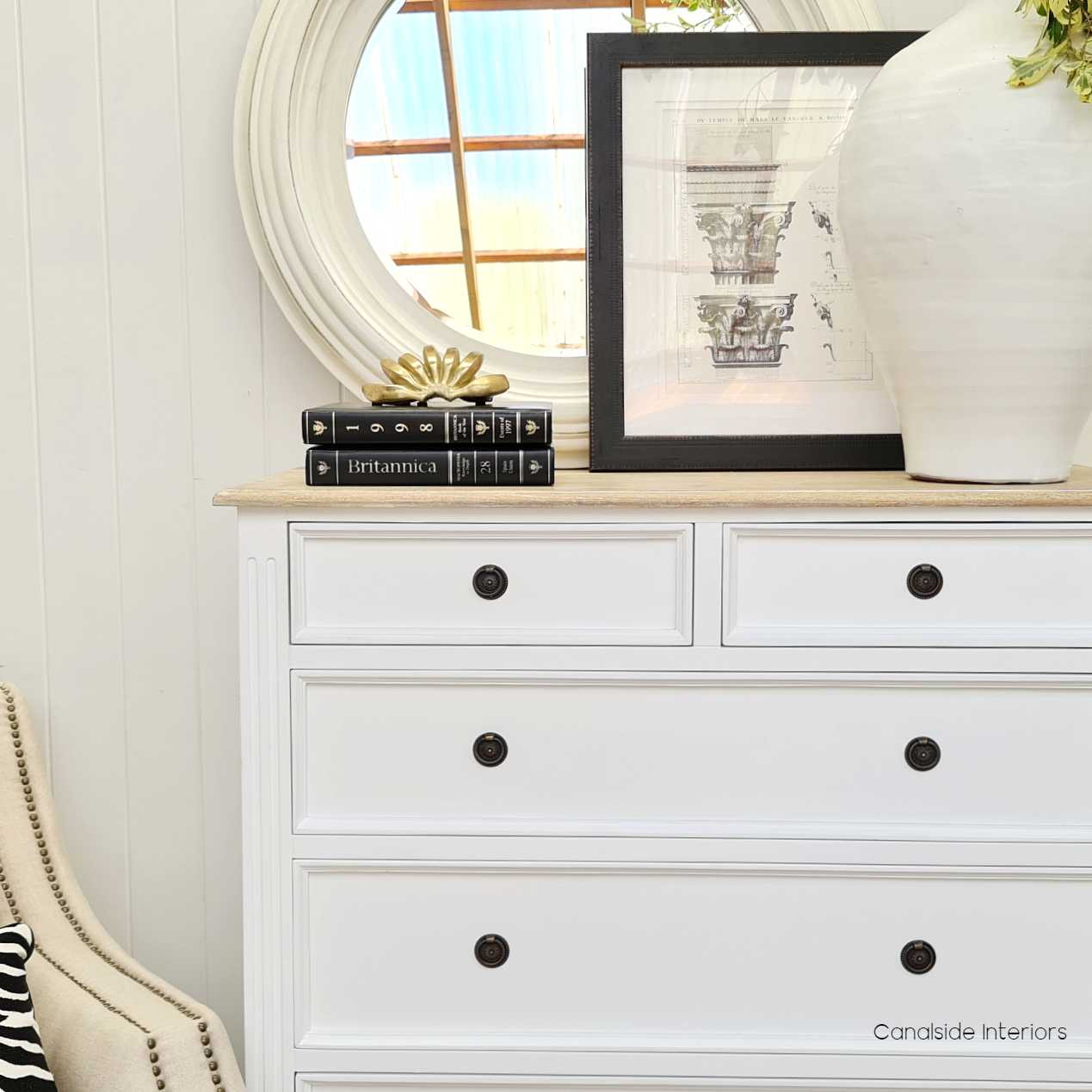 Styled against a French country decor backdrop, the chest seamlessly blends with both contemporary and classic design themes.