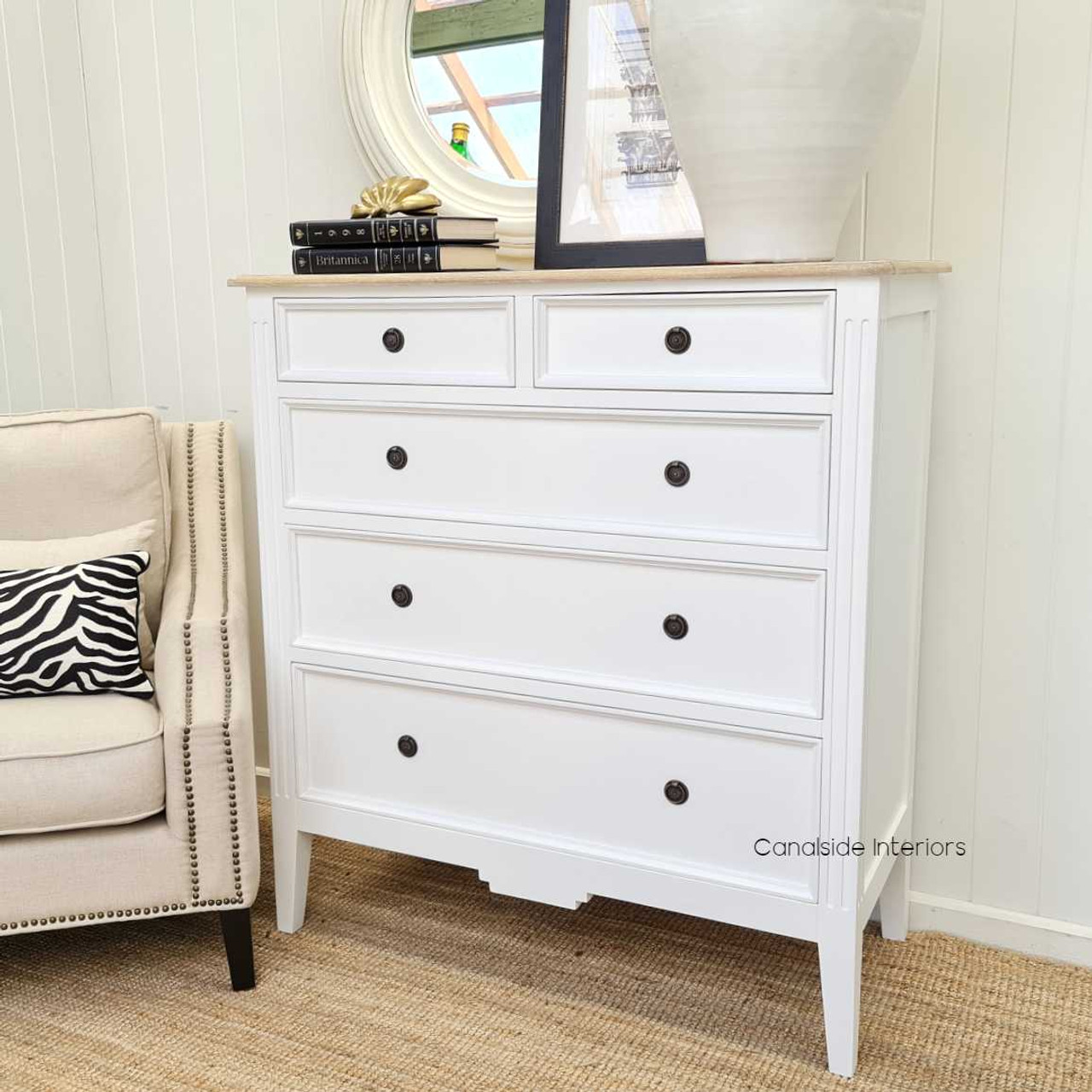 Lifestyle image depicting the chest in a chic living room setup, illustrating its versatility across various decor styles.