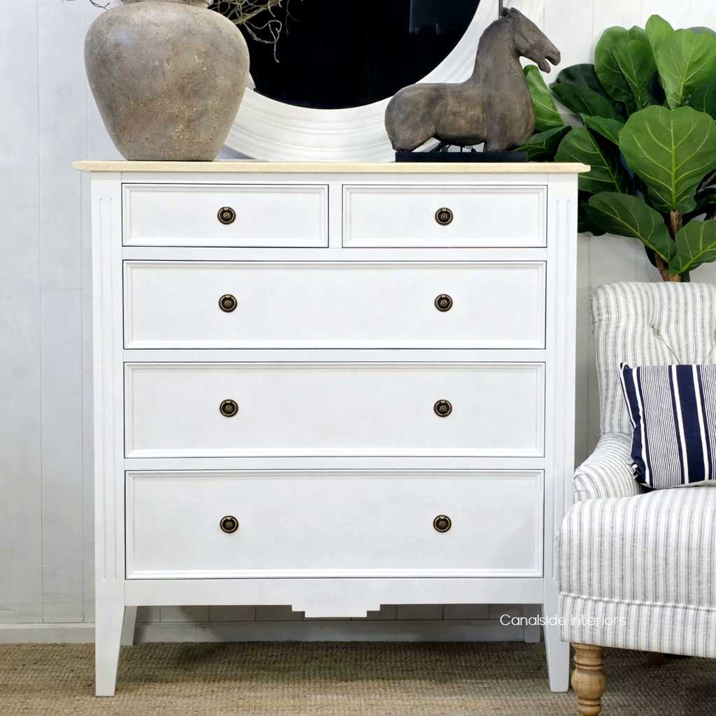 Straight on view of the Peninsula 5 Drawer Tall Chest, showcasing its crisp white finish with a contrasting limewash top, ideal for sophisticated interiors.