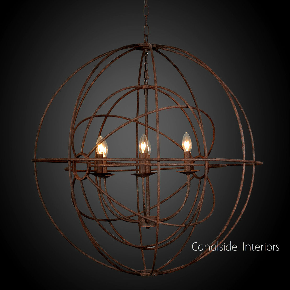 Canalside Interiors’ Foucault Twin Orb Chandelier in rust finish provides a timeless, quality light source, perfect for bringing a coastal ambiance to your living room