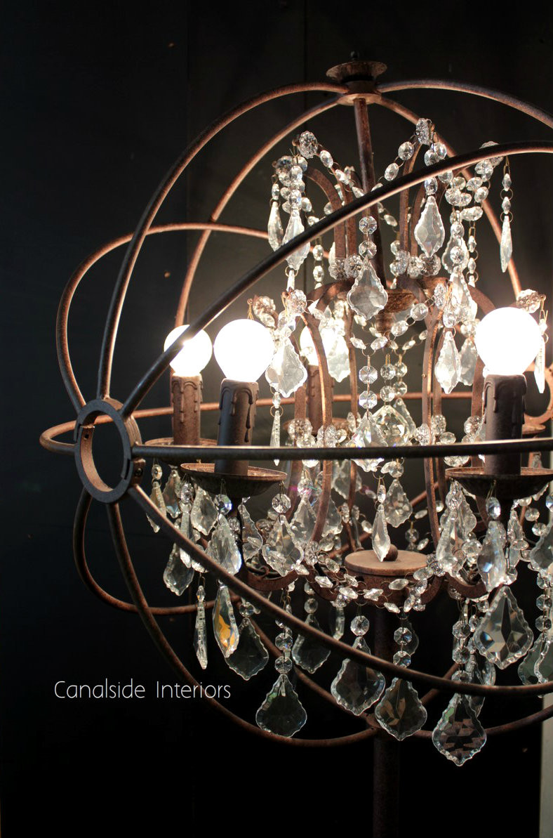 Revitalize your living room's lighting with a modern twist on classical design; the Industrial Rust Floor Lamp offers a vintage touch with its precision-cut crystals and unique rust finish - Canalside Interiors