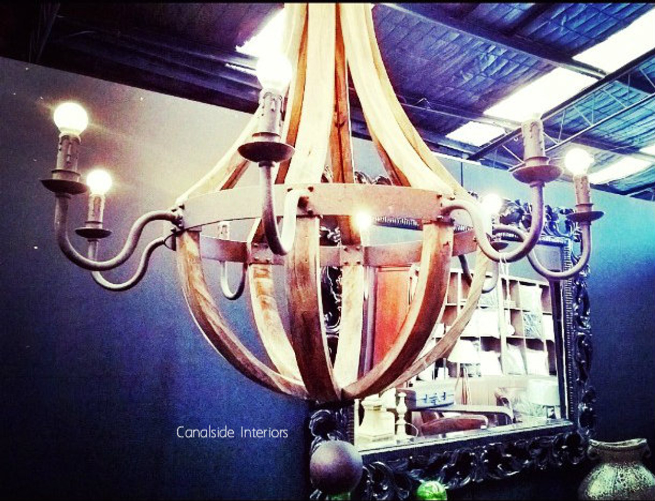 A lifestyle image depicting the chandelier in a library, where its soft light illuminates the room, enhancing the mood for reading and relaxation.