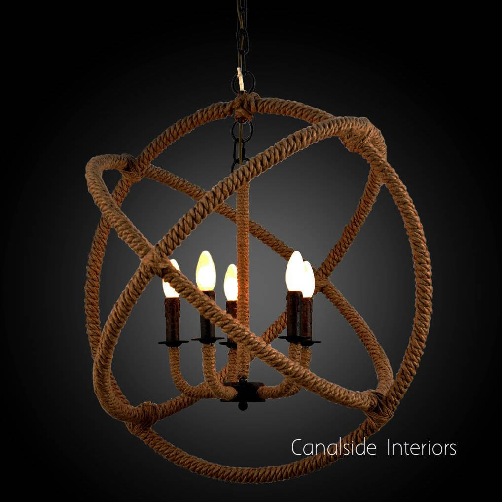 Blending Hamptons grace with an industrial vibe, Canalside Interiors' Lannister Chandelier enhances living rooms with its distinctive rope-wrapped design