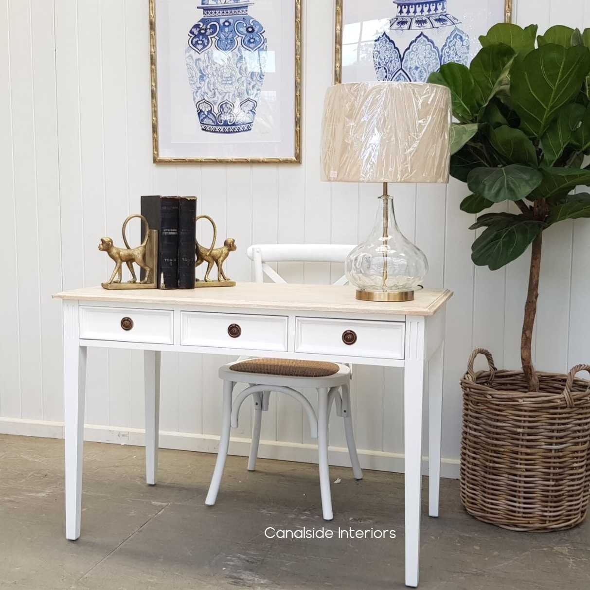 Angled shot of the desk/console, illustrating the smooth metal runners on the drawers for effortless functionality.