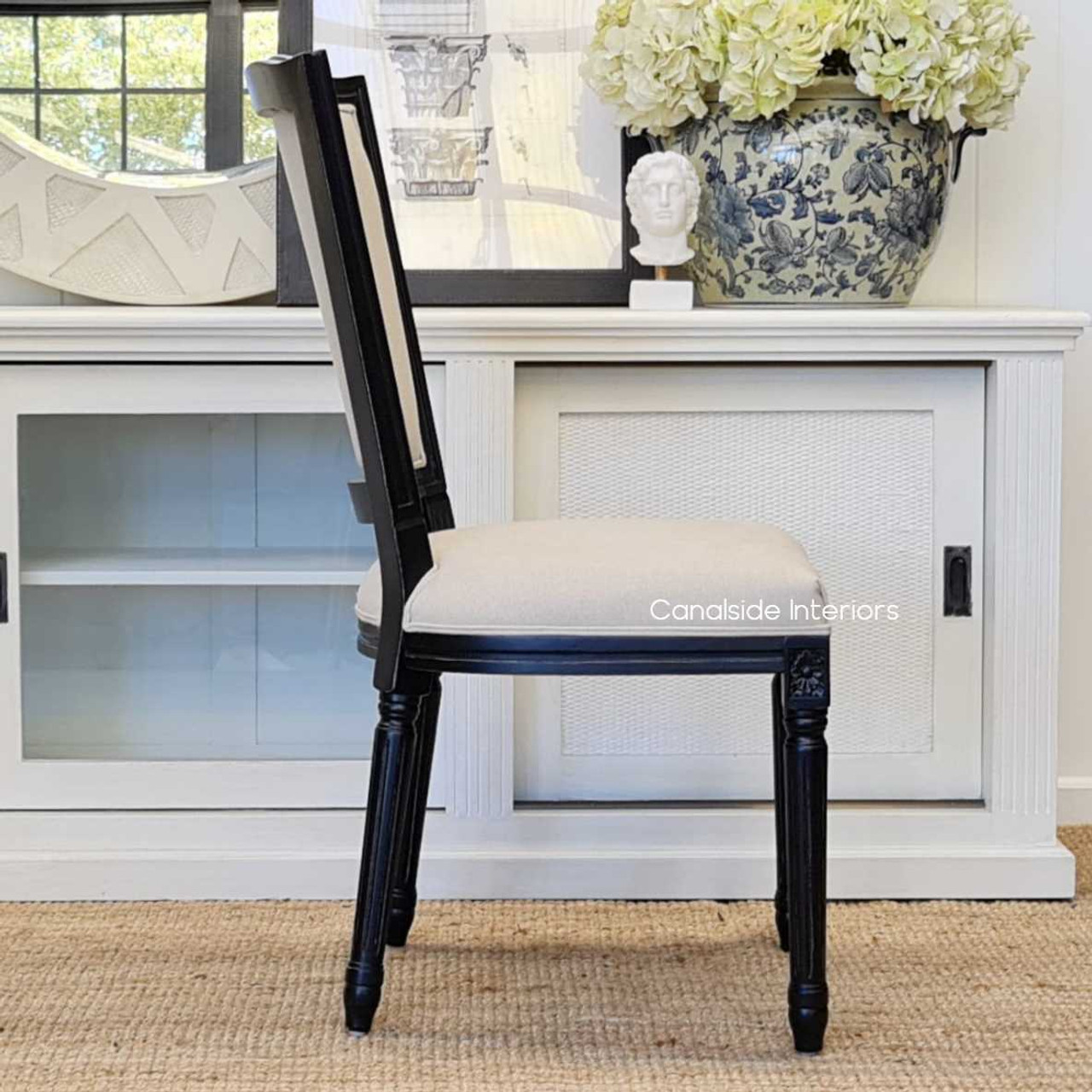 Discover the blend of traditional and modern in the Stark Dining Chair, perfect for Hamptons-inspired interior designs - Canalside Interiors