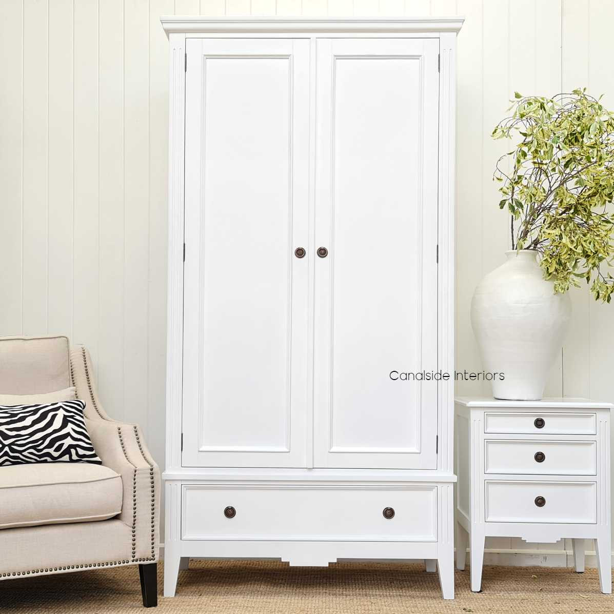 The Peninsula Wardrobe styled in a coastal-themed bedroom, enhancing the space with its timeless design and functional storage.